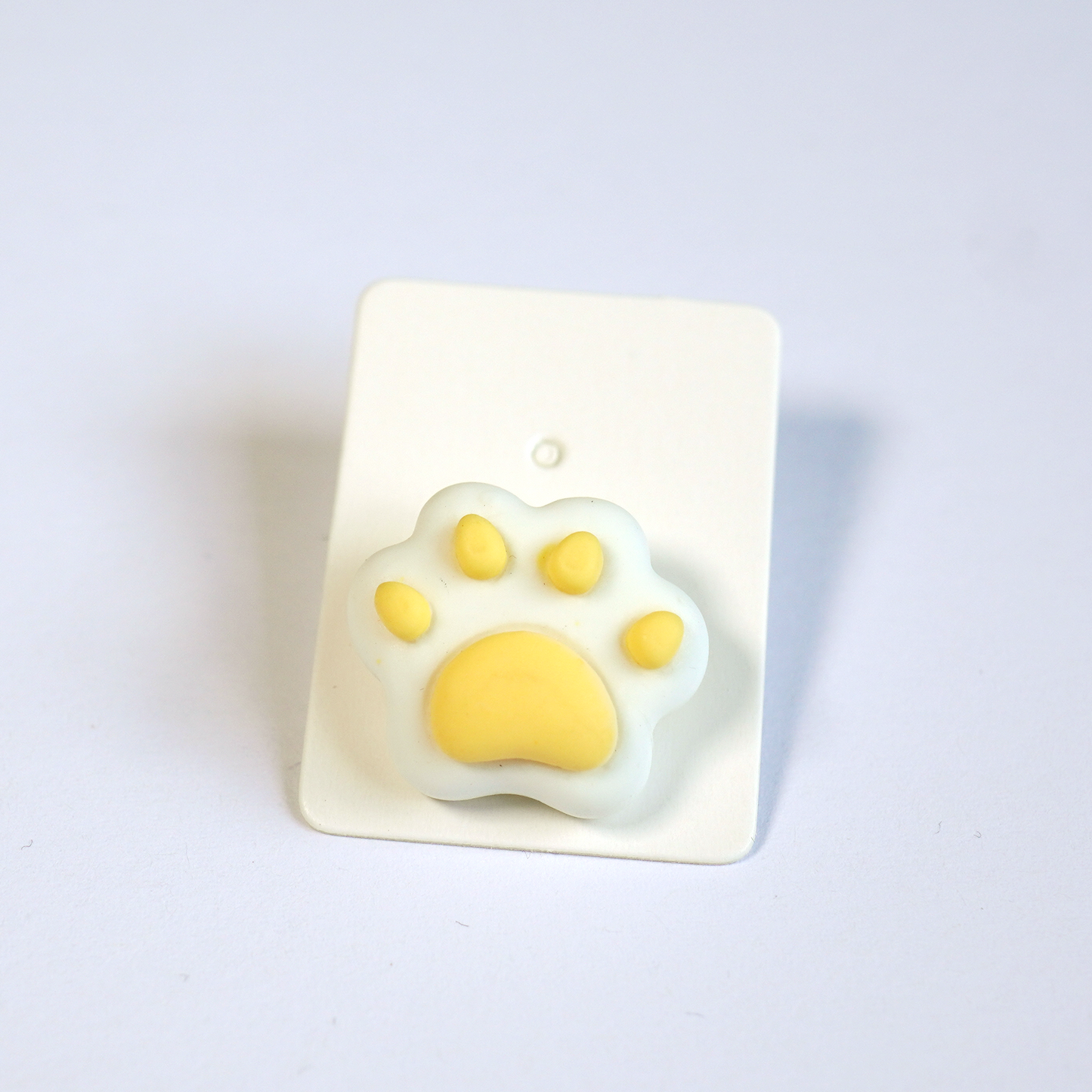 Yellow dog paw brooch